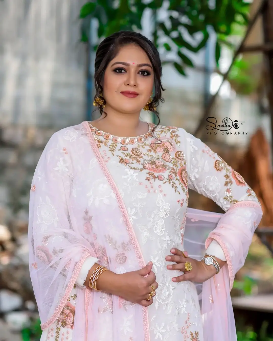 Meghana Raj Wearing Beautiful Earring White Designer Gown